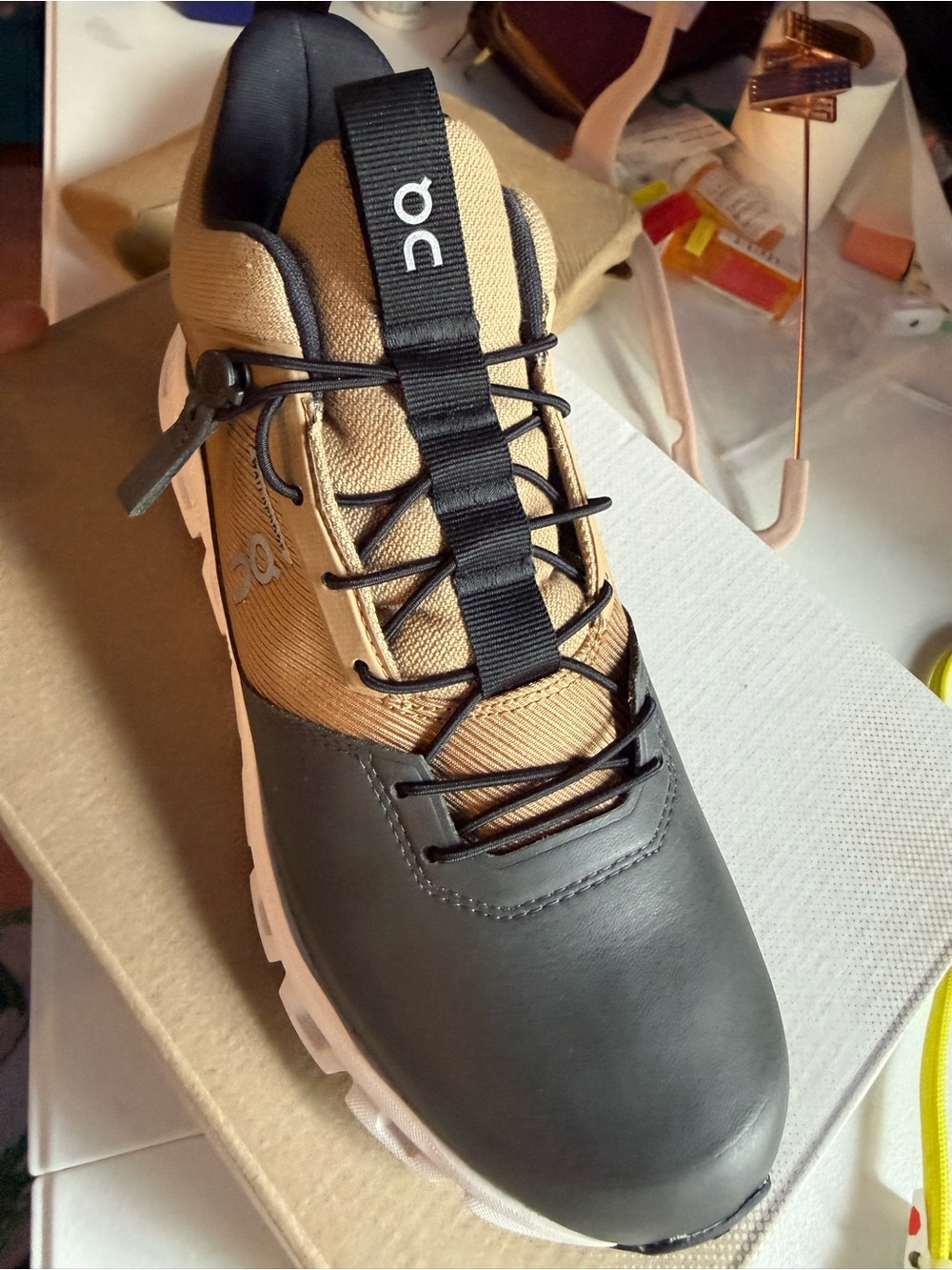 On Running Men's Athletic Shoe in Tan and Black - Picture 3 of 12